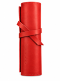 Red leather organiser rolled